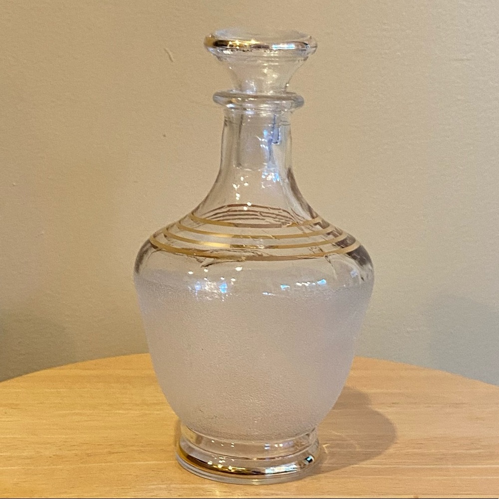 Decanter frosted glass gold trimming 7” tall.